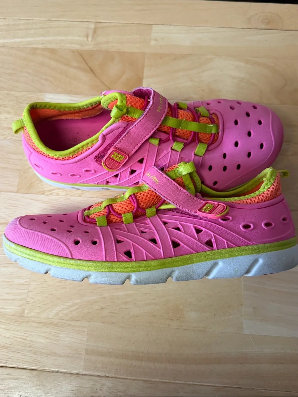 Stride Rite Made2Play Phibian pink water shoes with bright green and orange 3
